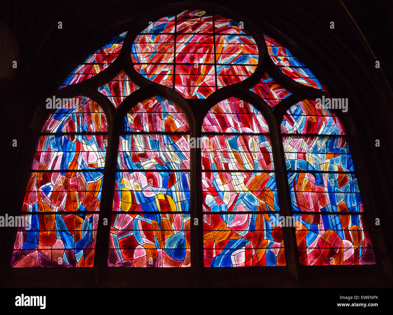 One of a series of stain glass windows in Saint-Severin designed  by Jean Rene Bazaine.  Each Jean Rene Bazaine window is dedica Stock Photo