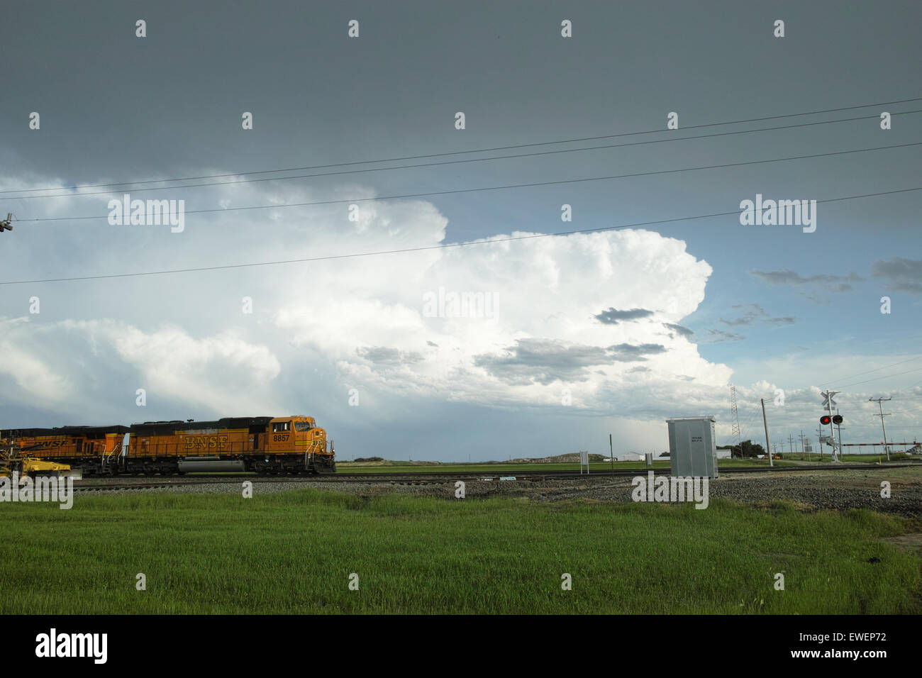 bnsf burlington northern santa fe train going into storm Stock Photo