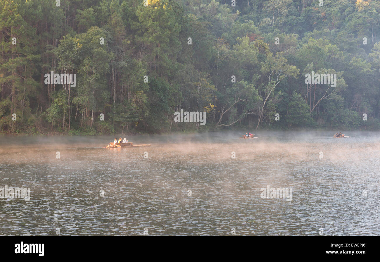 bamboo raft in the morning mist, Pang Ung Lake, Mae Hong Son, Thailand Stock Photo