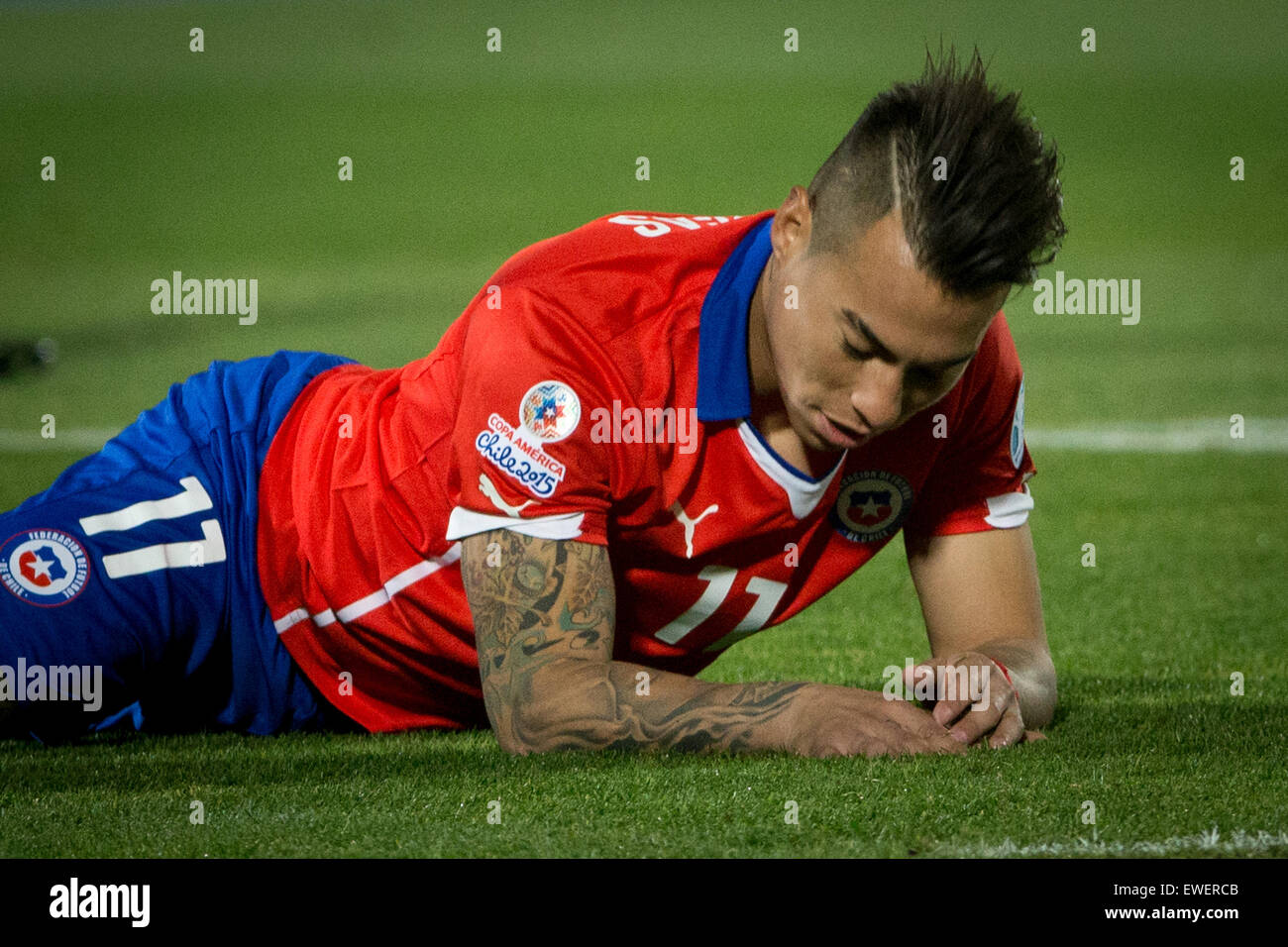 Santiago, Chile. 24th June, 2015. Eduardo Vargas of Chile reacts during the quarterfinal between Chile and Uruguay at 2015 Copa America in Santiago, Chile, on June 24, 2015. Chile won 1-0. Credit:  Jorge Villegas/Xinhua/Alamy Live News Stock Photo