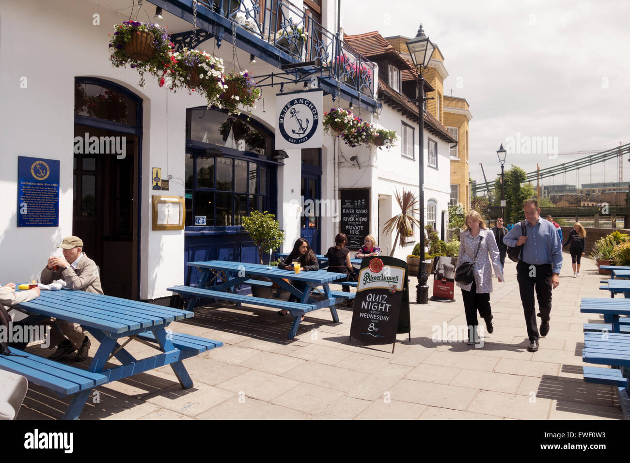 The Blue Anchor pub on the River Thames at Hammersmith, London on a sunny summers day, Hammersmith, London UK Stock Photo