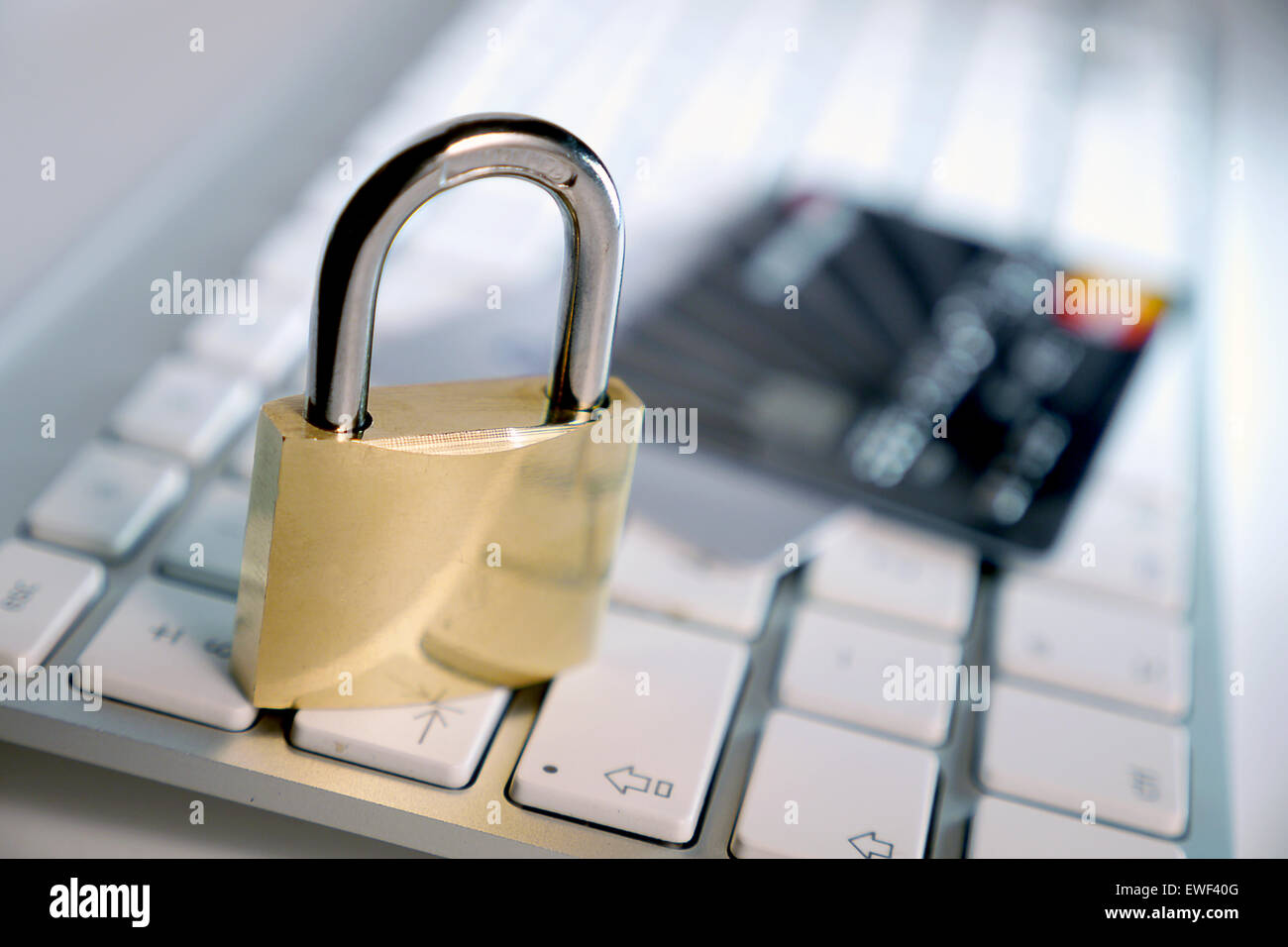 computer keyboard and lock with credit card Stock Photo - Alamy