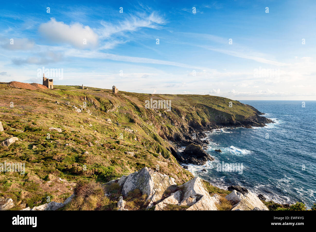 Wheal Owles and Wheal Edward engine houses on the South West Coast Path at Botallack on the Cornish coast Stock Photo