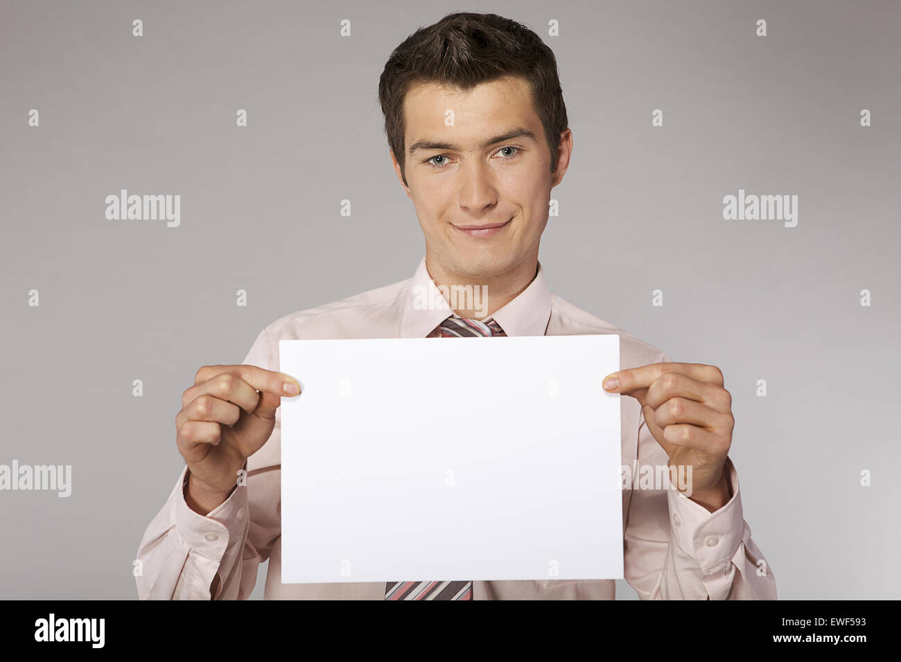 Young happy businessman Stock Photo - Alamy