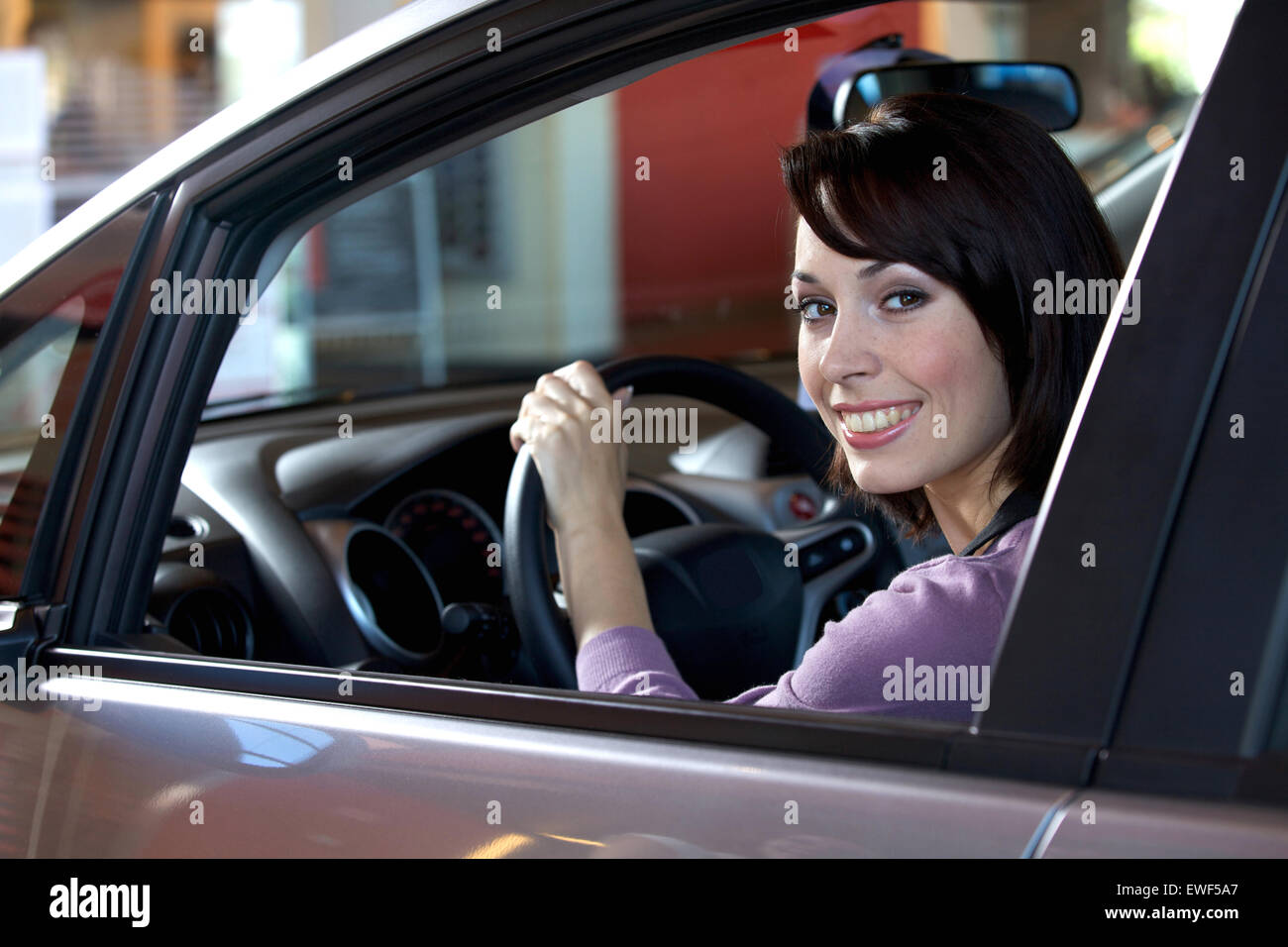 Woman in car drivers seat hi-res stock photography and images - Alamy