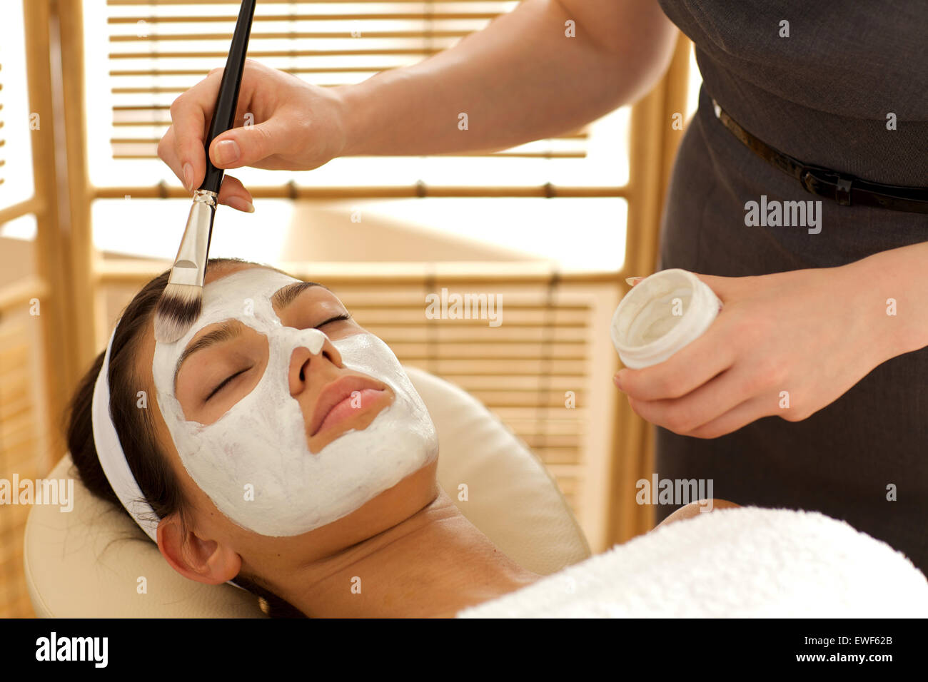 Close-up of young woman receiving beauty treatment in spa Stock Photo