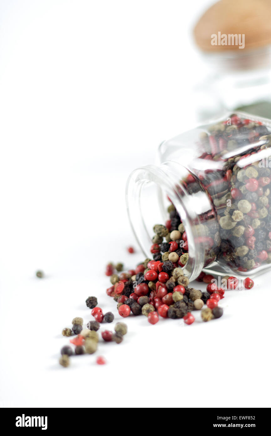 Mixed pepper seeds of various colours red black green Stock Photo