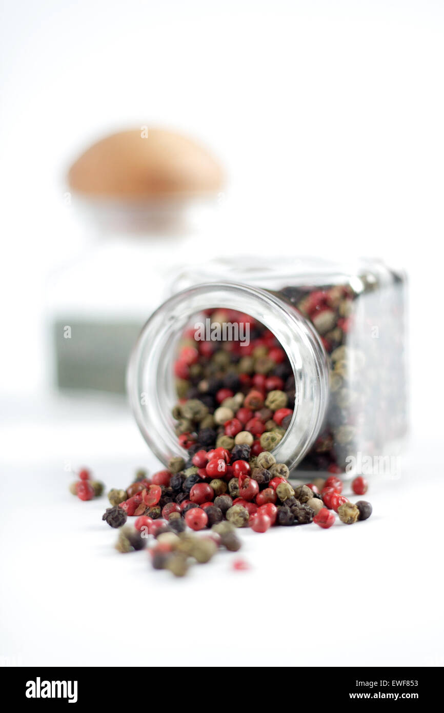 Mixed pepper seeds of various colours red black green Stock Photo