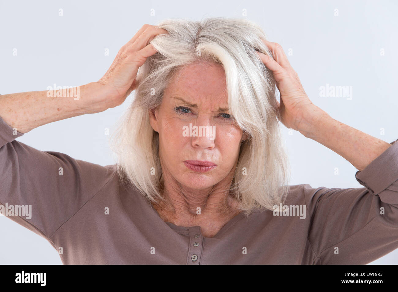 ITCHING IN A SENIOR Stock Photo Alamy