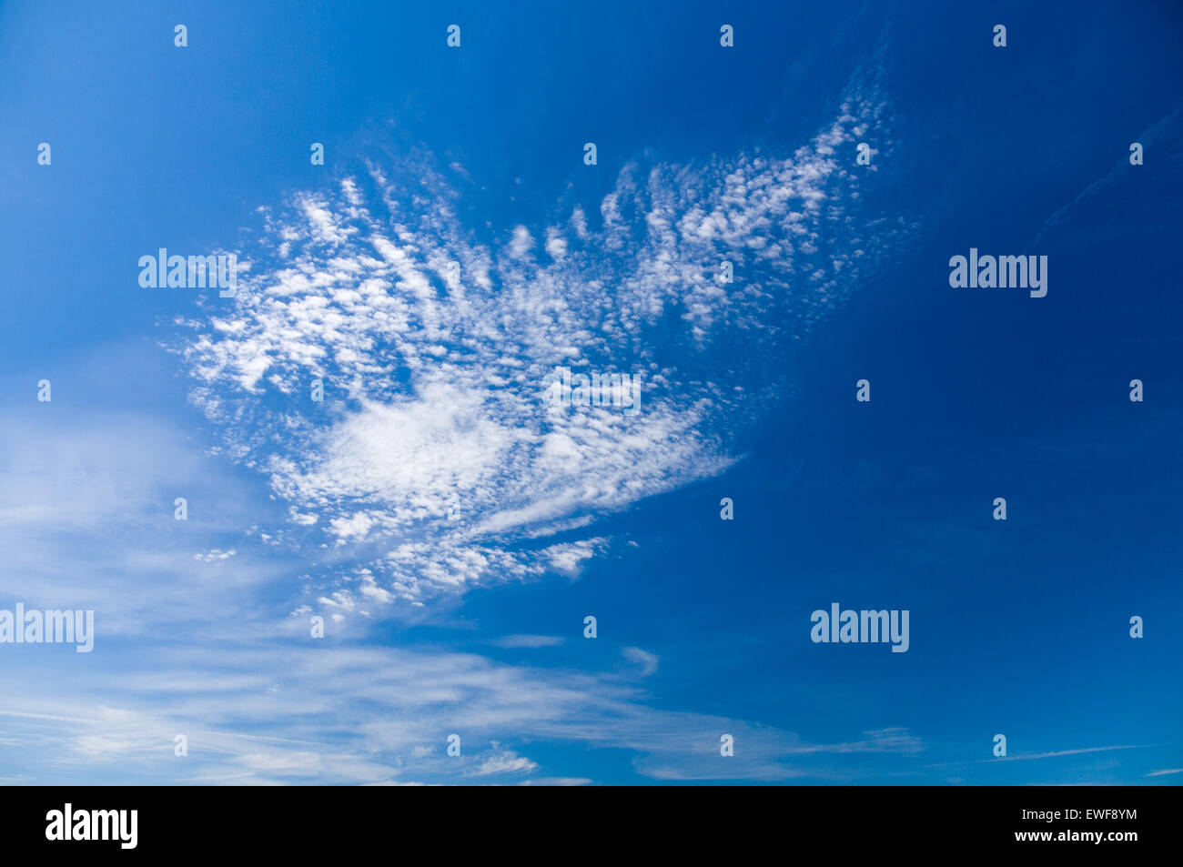 Blue sky with cirrus and stratus clouds, wide view Stock Photo Alamy