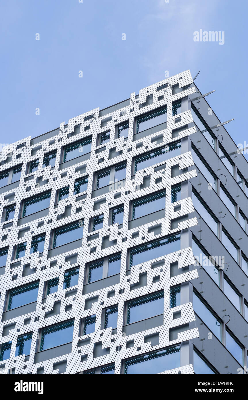 Part of modern business building against blue sky Stock Photo - Alamy