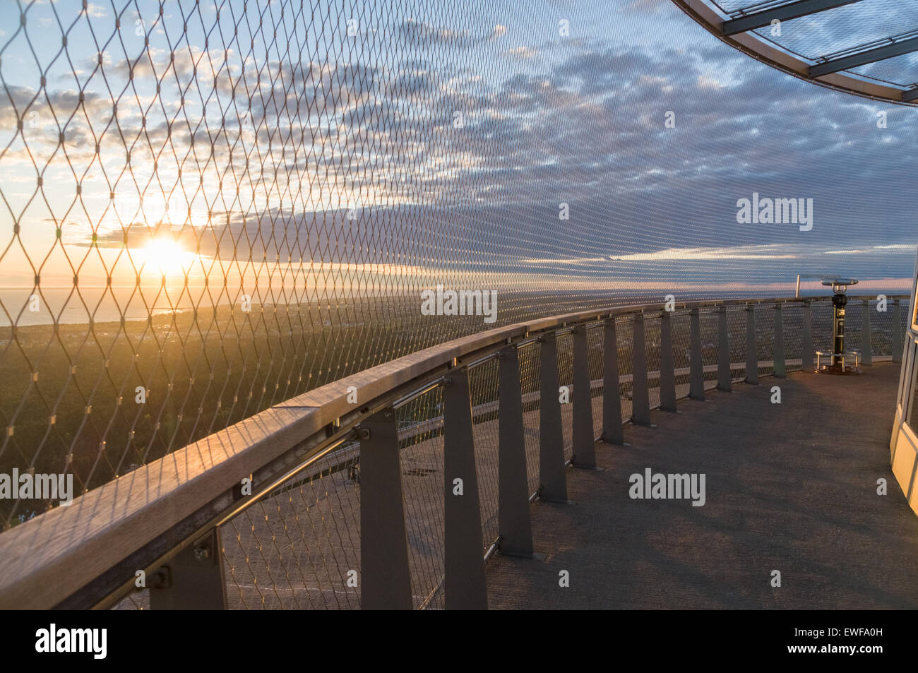 Coin operated panoramic telescope on TV tower, sunset view Stock Photo
