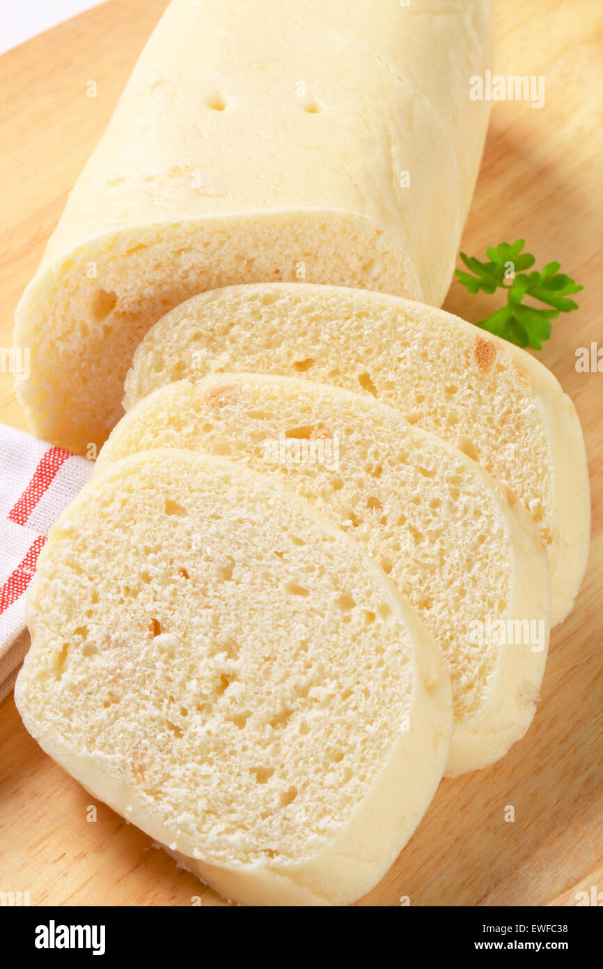 Czech bread dumplings on cutting board Stock Photo