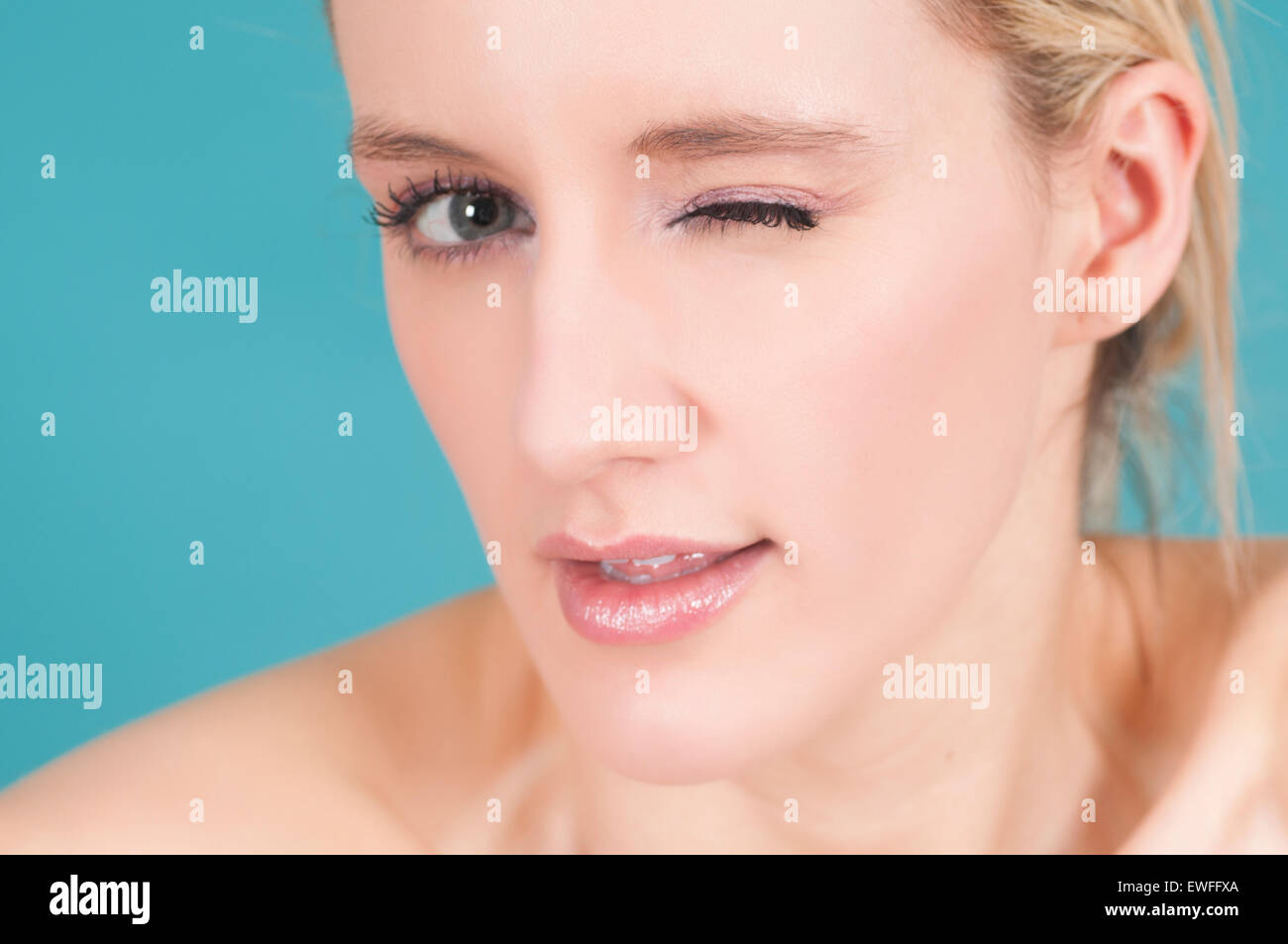 Beautiful Young Caucasian Woman Winking Stock Photo Alamy