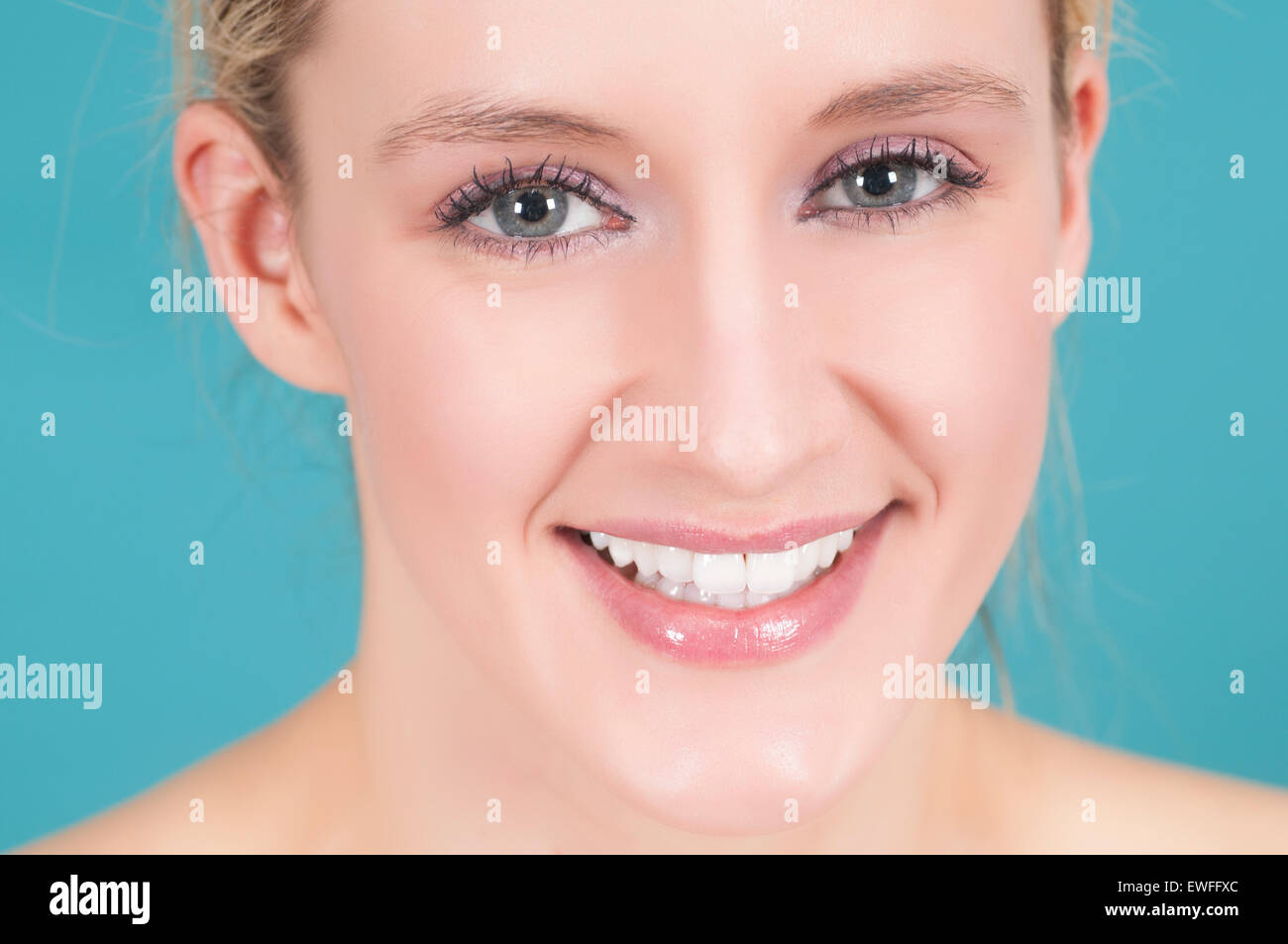Beautiful young Caucasian woman smiling Stock Photo - Alamy