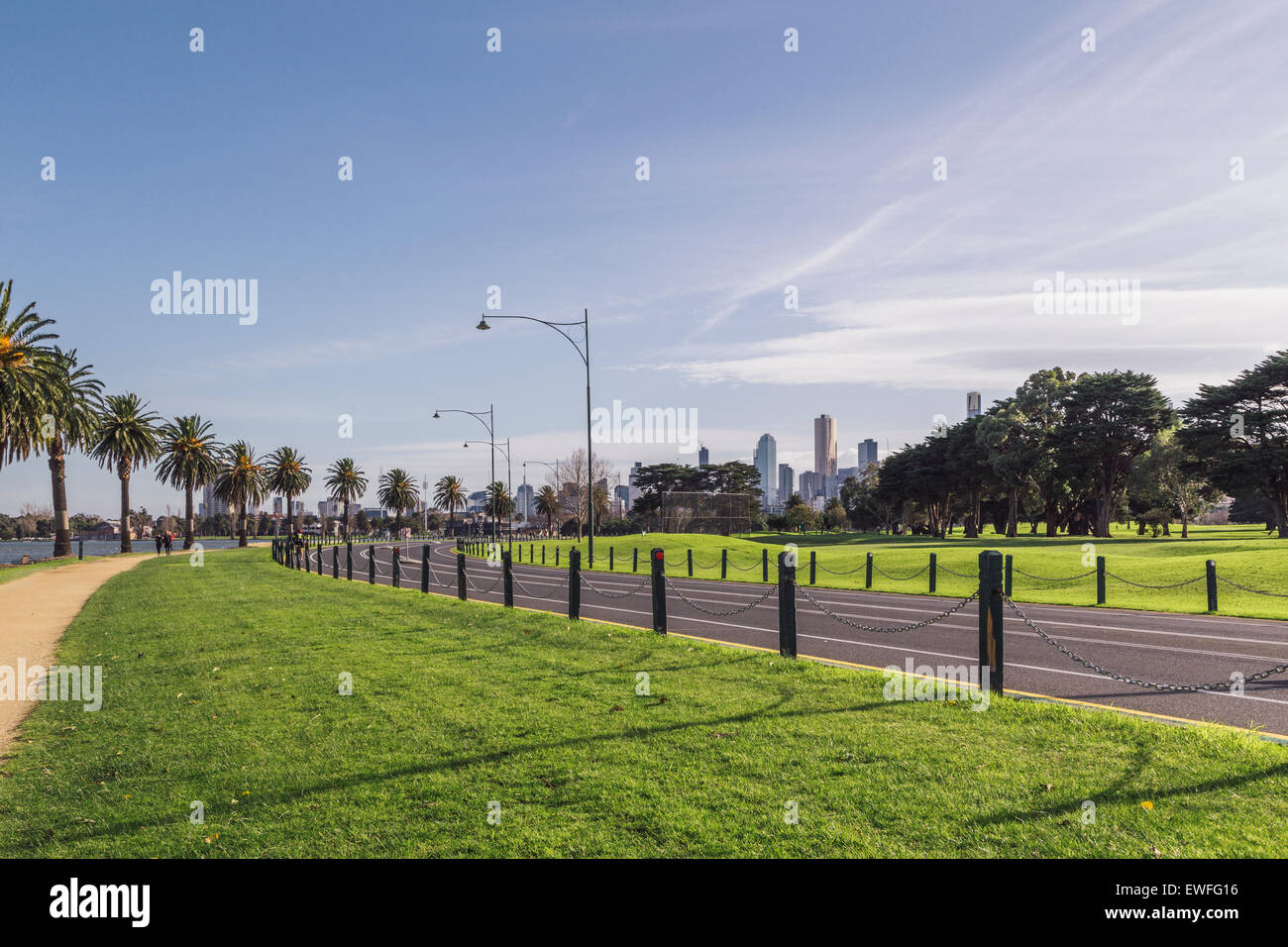 Melbourne City skyline seen from Albert Park Lake and Lakeside Drive, Melbourne, Victoria, Australia Stock Photo
