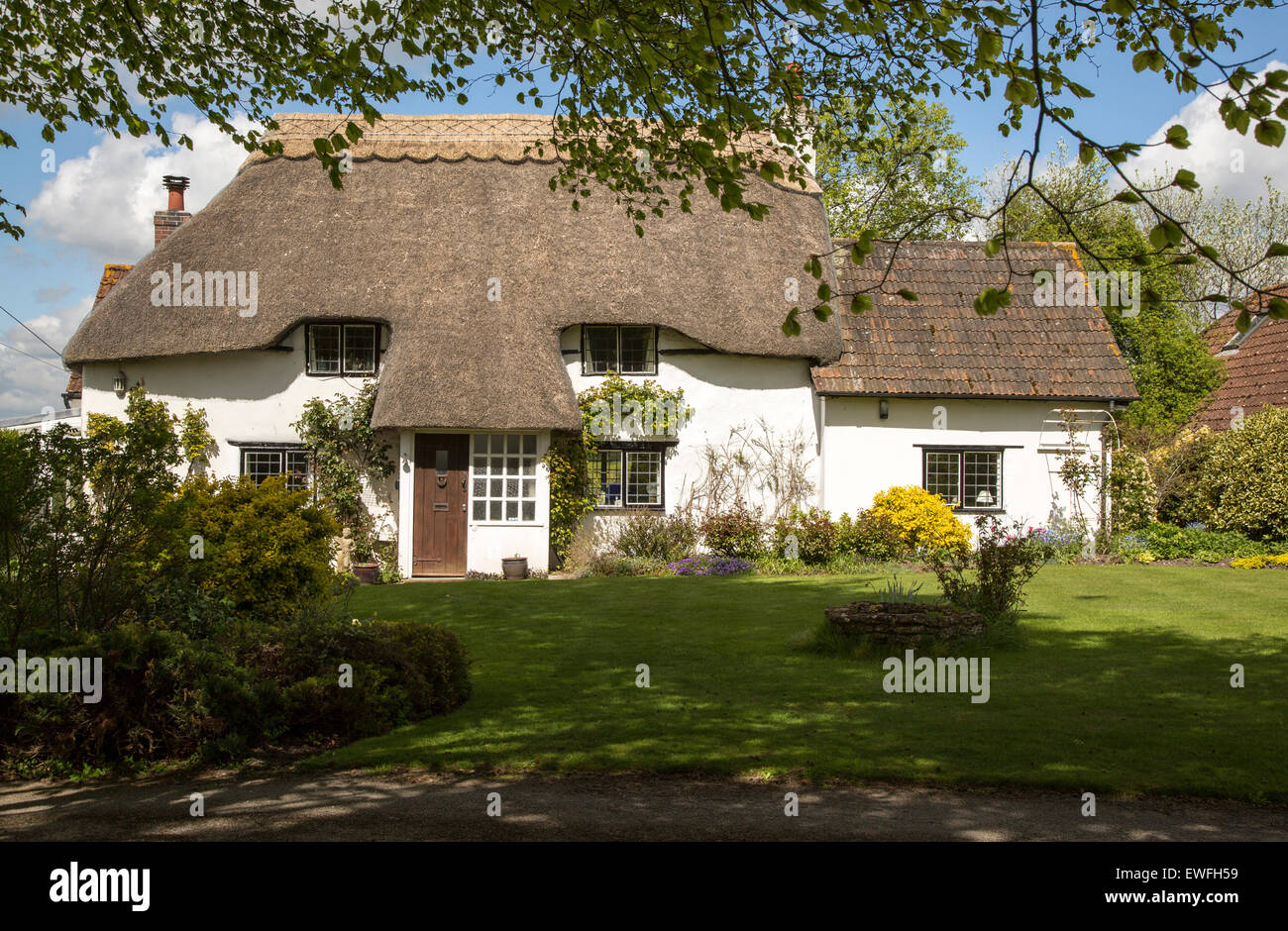 Thatched attractive country cottage, Cherhill, Wiltshire, England, UK Stock Photo