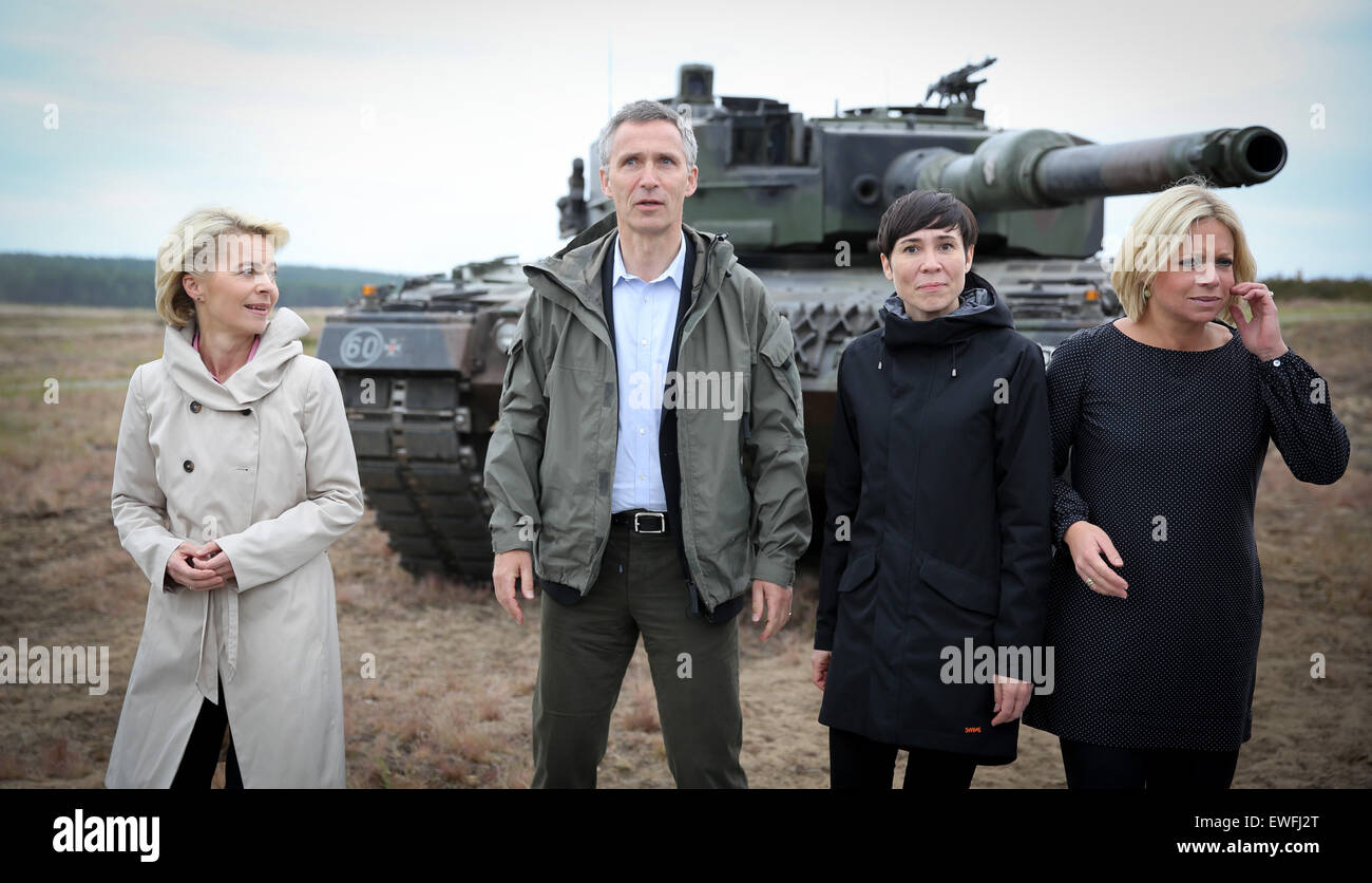 German Defence Minister Ursula von der Leyen (from left), NATO Secretary General Jens Stoltenberg, Norwegian Defence Minister Ine Marie Eriksen Soreide and Dutch Defence Minister Jeanine Hennis-Plasschaert observe a large-scale military training exercise last week in Poland aimed at readying troops for a potential threat from Russia. Stoltenberg said Thursday in Brussels that NATO is providing Ukraine with additional support in demining and overseeing its airspace. DPA/KAY NIETFELD Stock Photo