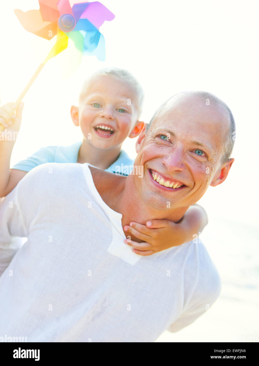 Family playing at the beach hi-res stock photography and images - Alamy
