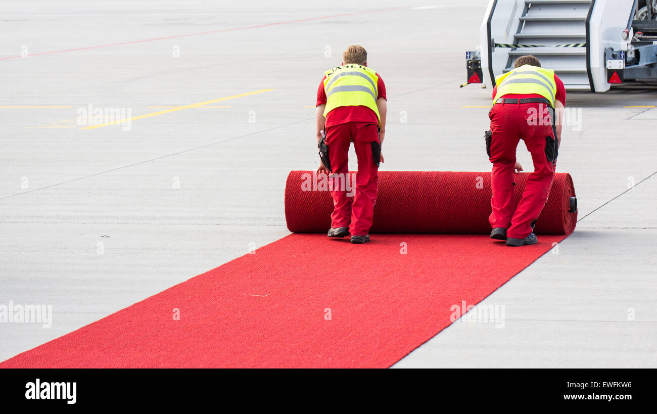 Rolling out the red carpet, Franz-Josef Strauss Airport Munich, Bavaria, Germany Stock Photo