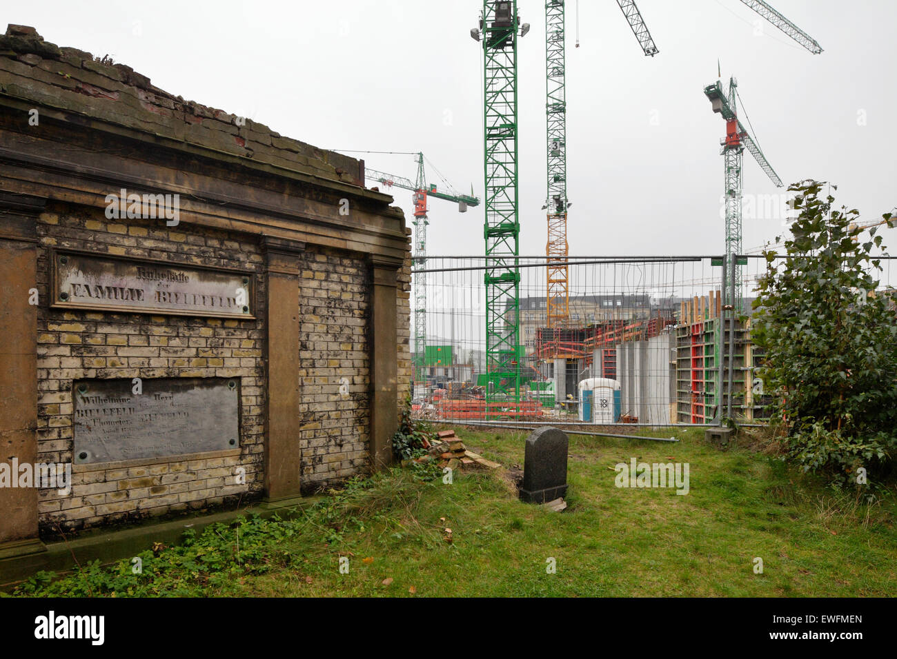 Berlin, Germany, St. Hedwig cemetery wall and construction of the new building project The