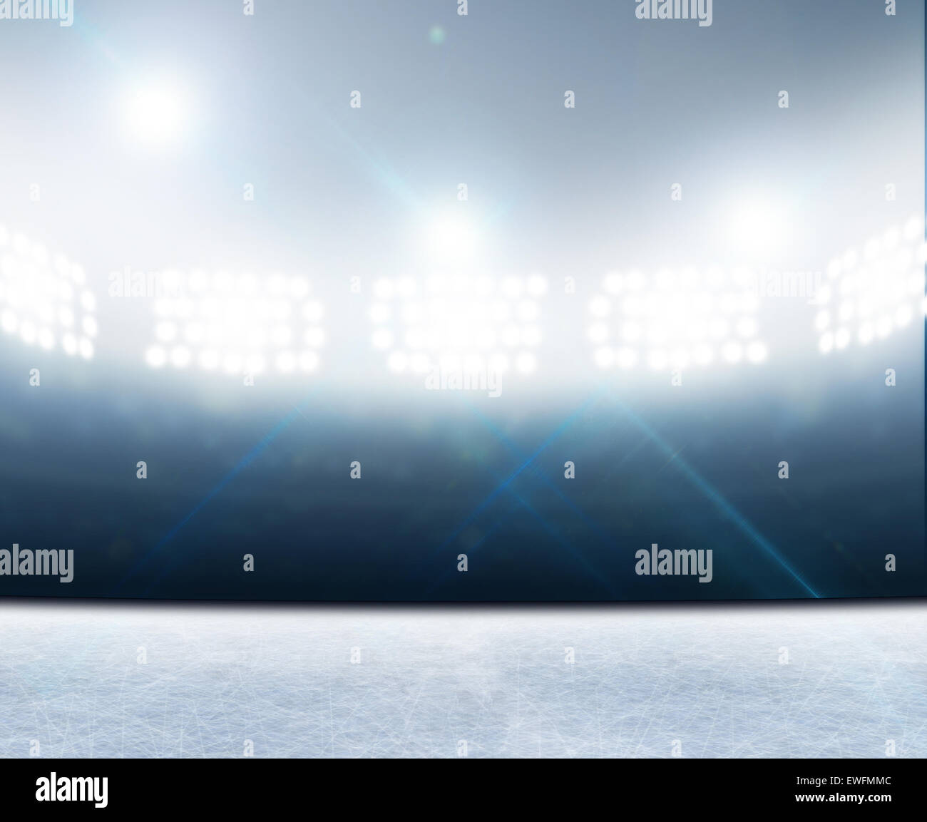 A generic ice rink stadium with a frozen surface under illuminated ...