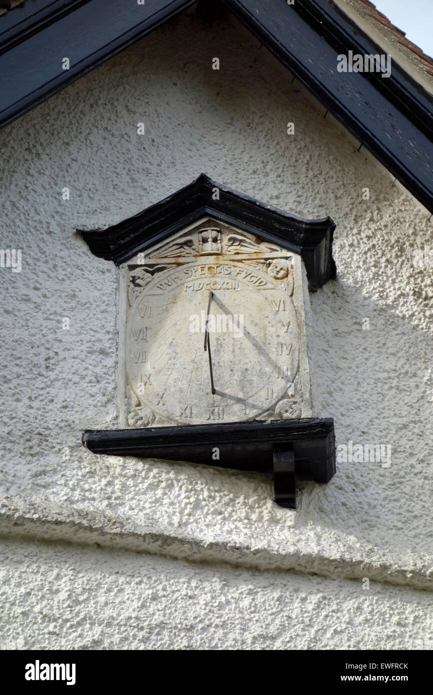 Sundial dating from 1793 on the wall of a cottage in the village of Westmill, Herts Stock Photo