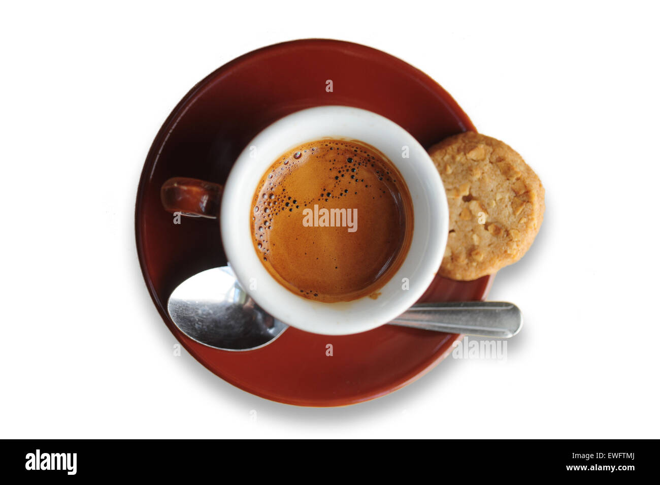 Food Coffee Cafe Espresso beverage served in a demitasse ceramic cup on white cut out Stock Photo