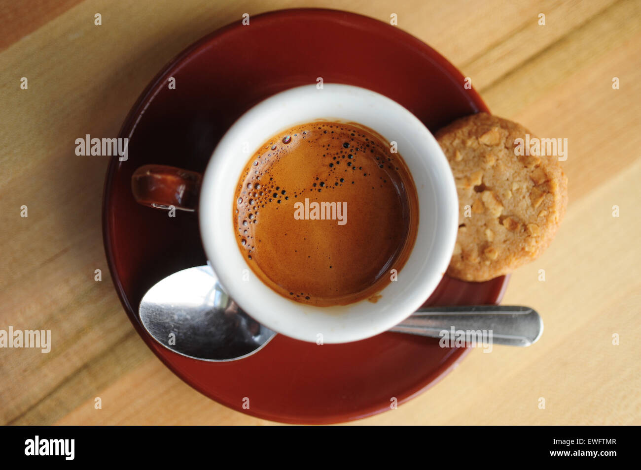 Food Coffee Cafe Espresso beverage served in a demitasse ceramic cup Stock Photo