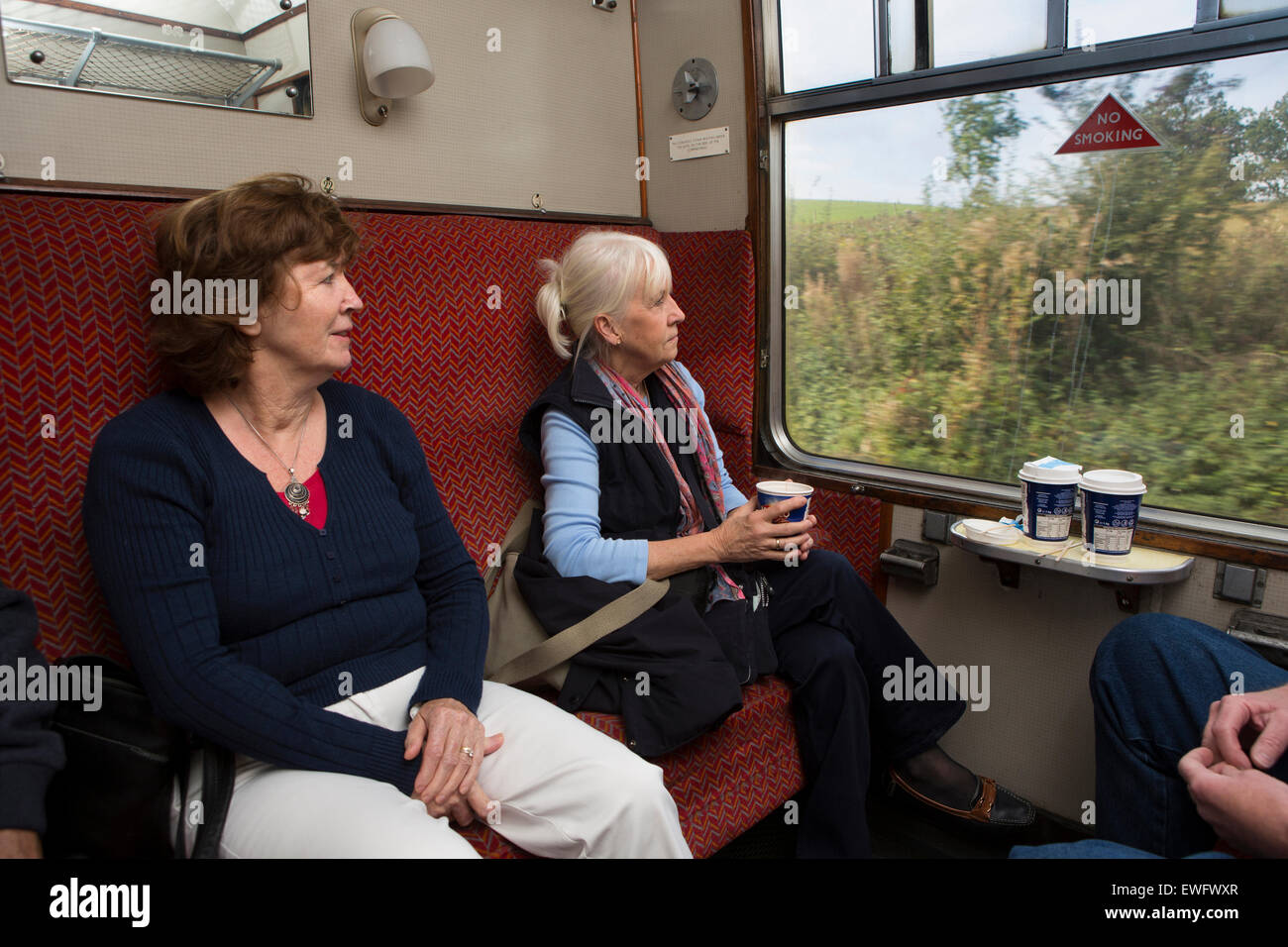 UK, England, Shropshire, Bridgnorth, Severn Valley Railway, passengers in first class carriage Stock Photo