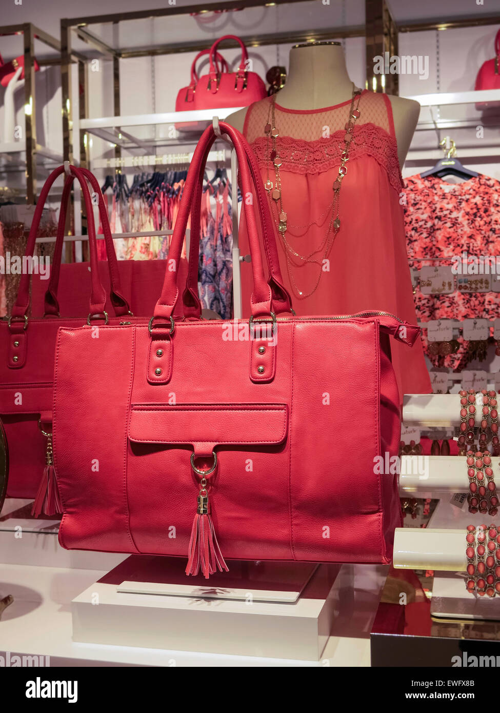 Charming Charlie, Women's Wear, Pink purses Fifth Avenue, NYC Stock Photo