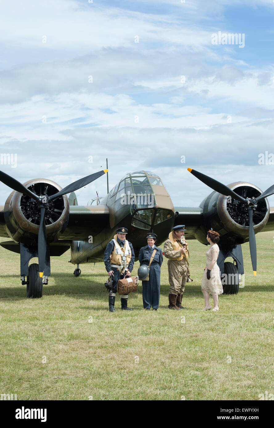 Air Force Re enactors in front of a Bristol Blenheim Bomber at Bicester flywheel festival. Oxfordshire, England Stock Photo