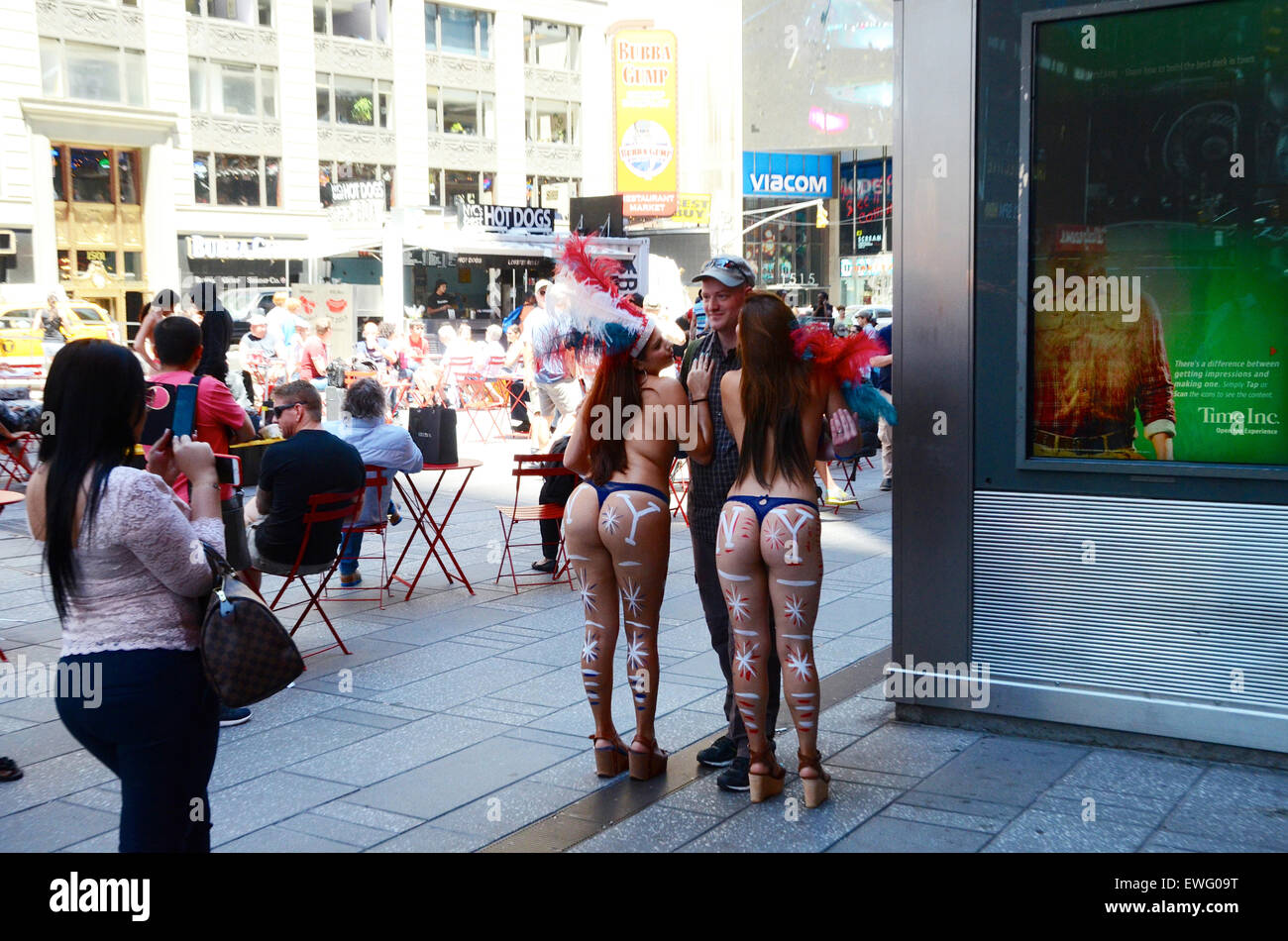 stars and stripes body paint women times square new york usa tourists photo Stock Photo