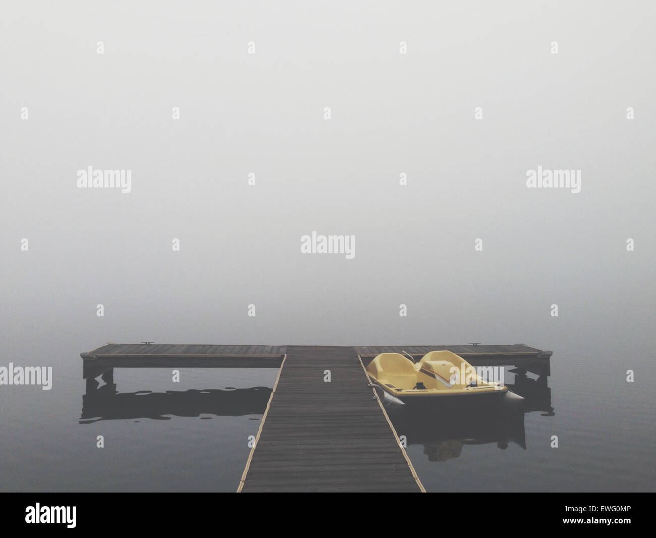 Deck Minimalism Paddle Boat Pier Still Water Water fog haze outdoor Stock Photo