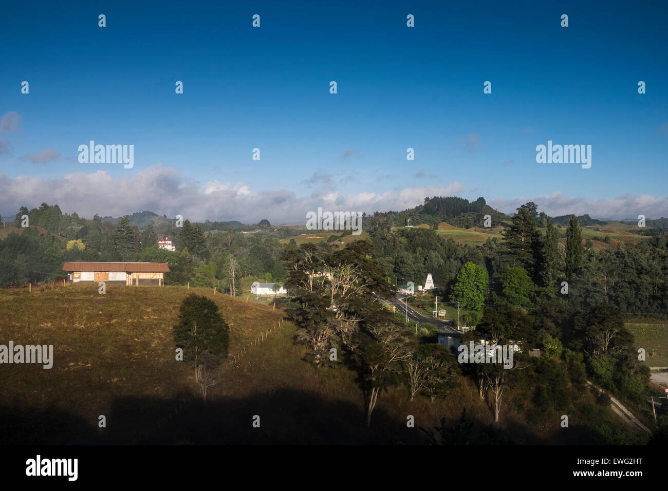 Waitomo at early morning with clearing mist on a summers day. New Zealand Stock Photo