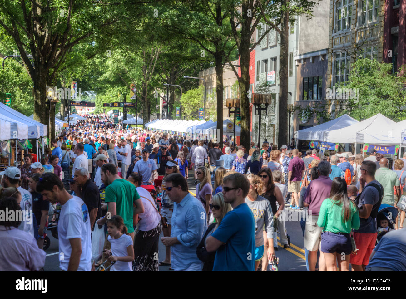 Shoppers crowd the streets of Greenville, SC in search of fresh local foods and local crafts at the TD Saturday Market. Stock Photo