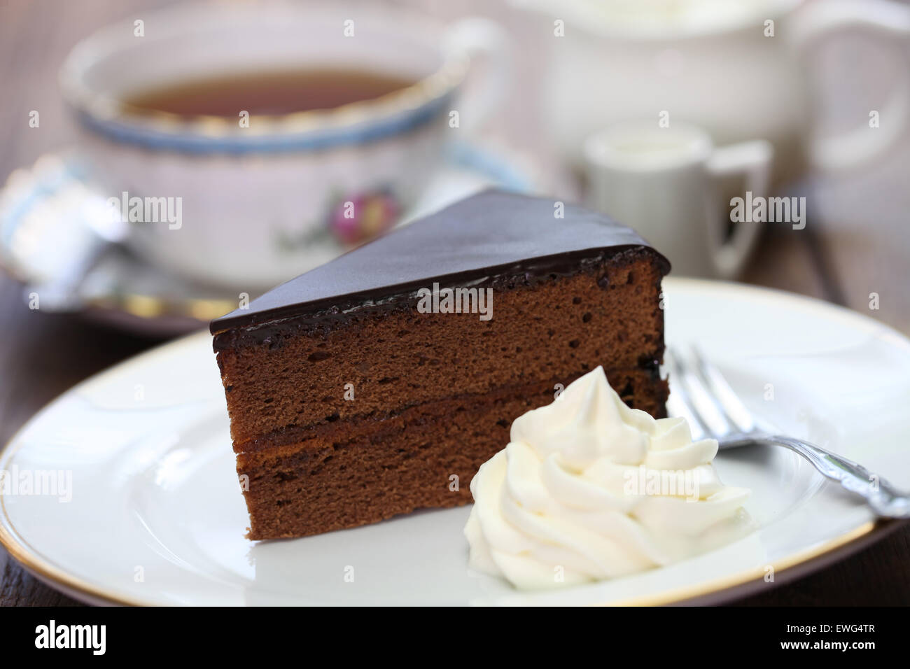 homemade sachertorte, Austrian chocolate cake and tea Stock Photo