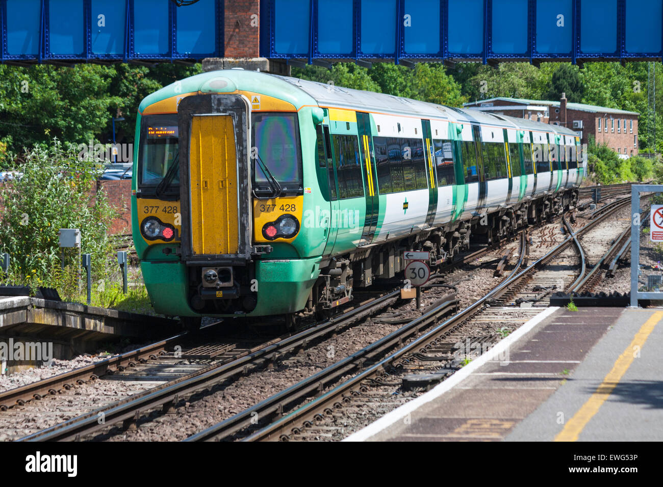 Southern train from Brighton approaching Southampton Central Station, Southampton, Hampshire UK in June Stock Photo