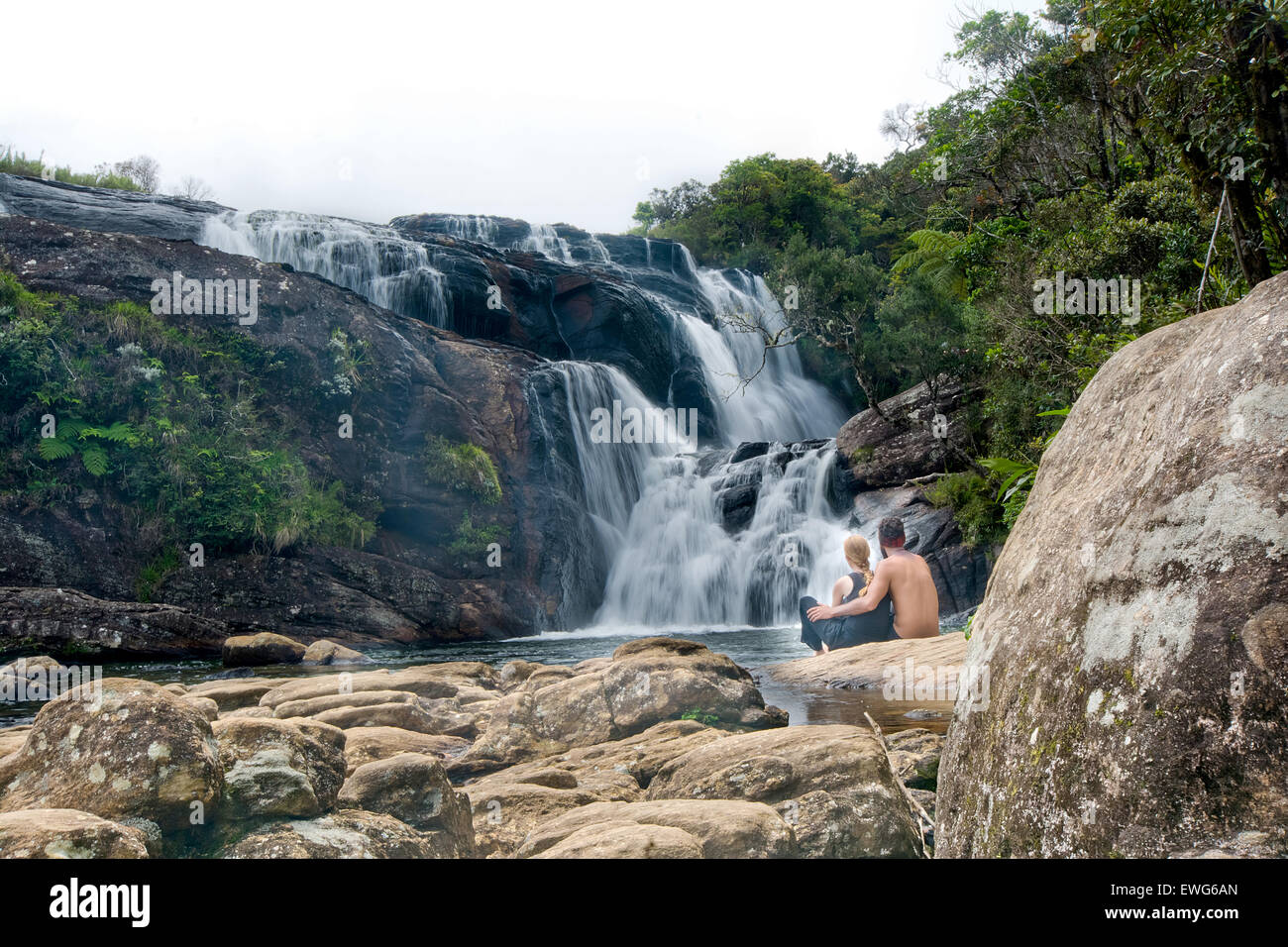A group of young foreigners are watching the waterfall at the end of Bakers Falls Stock Photo