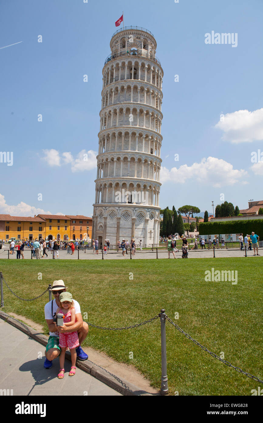 tourists taking selfie leaning tower of Pisa Italy Stock Photo