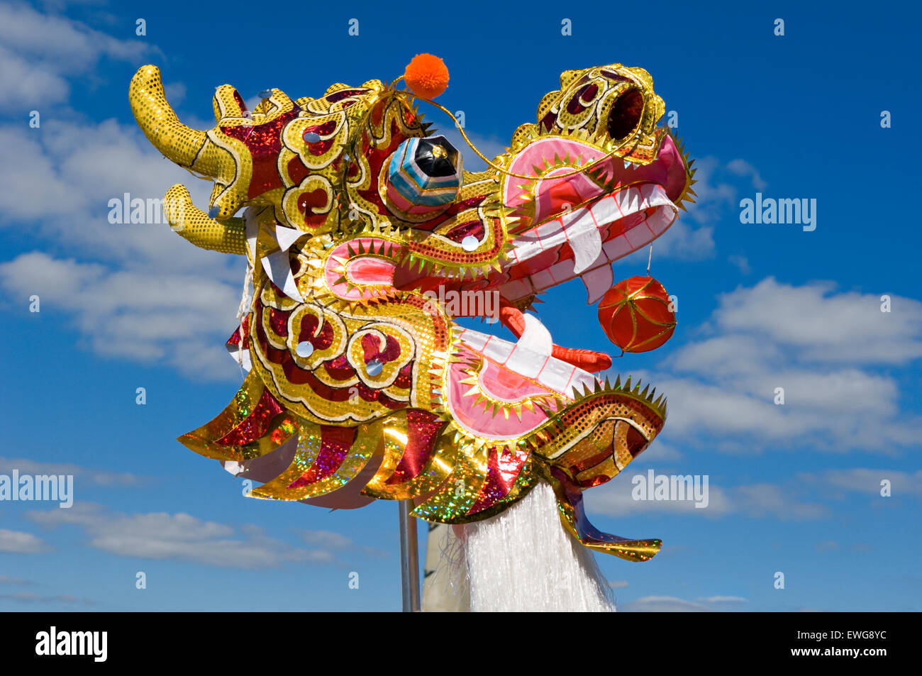Chinese Dragon Head Against a Blue Sky during the 2014 Dragon Boat Festival in Louisville Kentucky Stock Photo