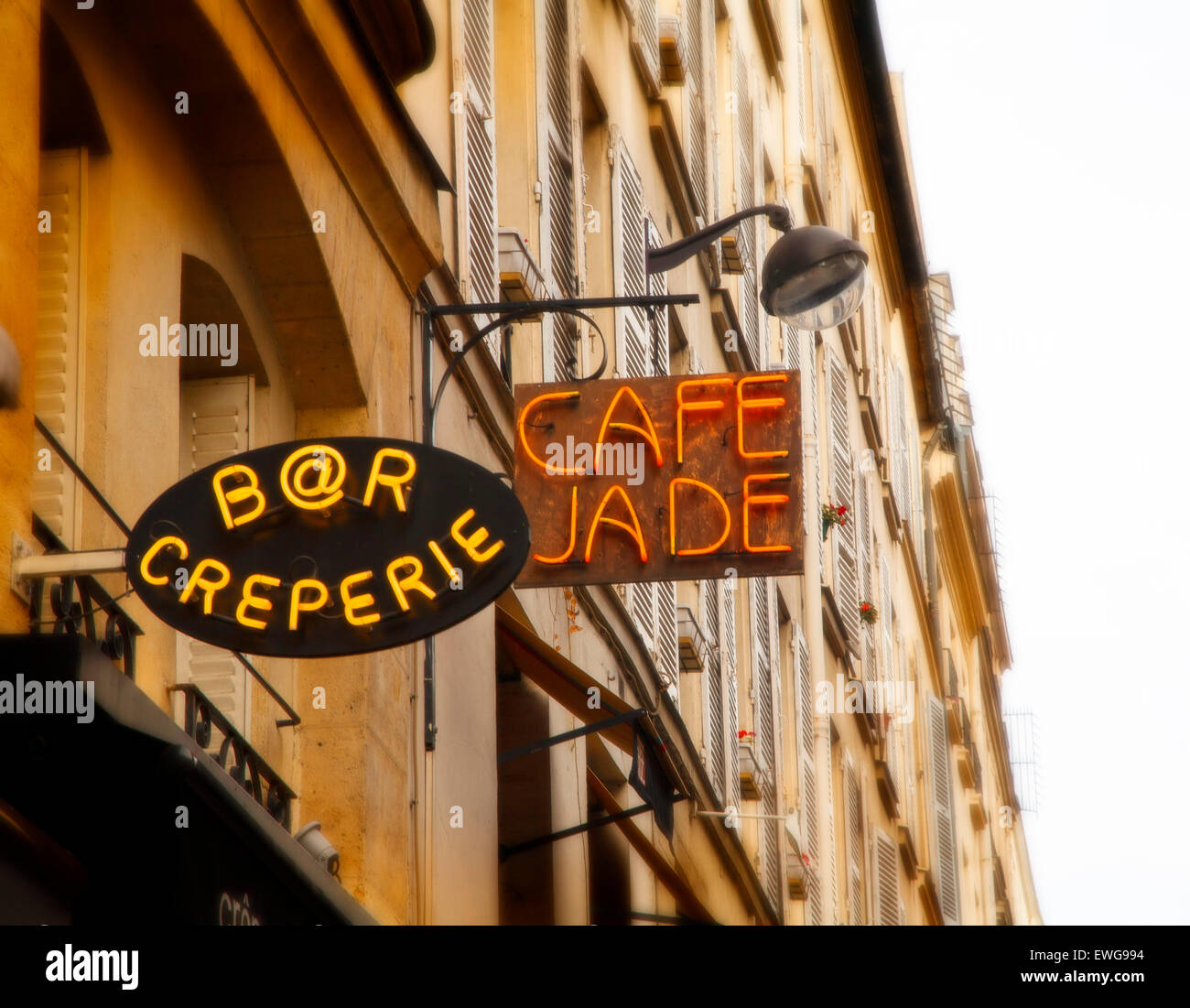 A Restaurant sign in a Paris neighborhood. Stock Photo