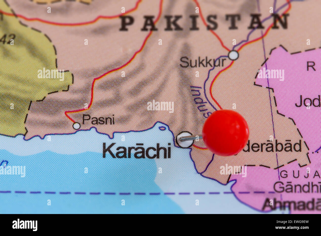 Close-up of a red pushpin on a map of Karachi, Pakistan Stock Photo