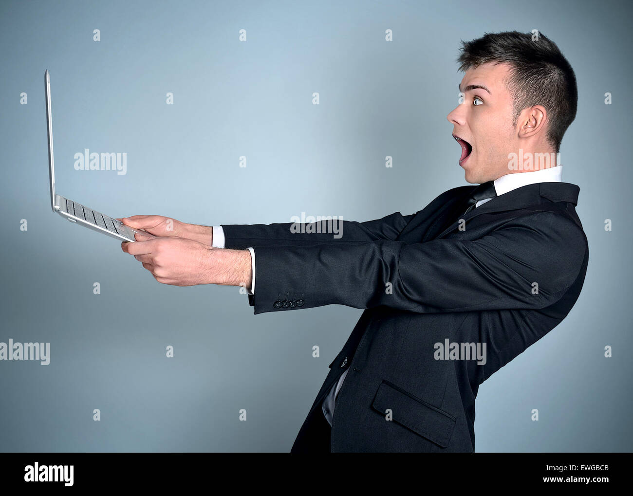 Young business man shocked hi-res stock photography and images - Alamy