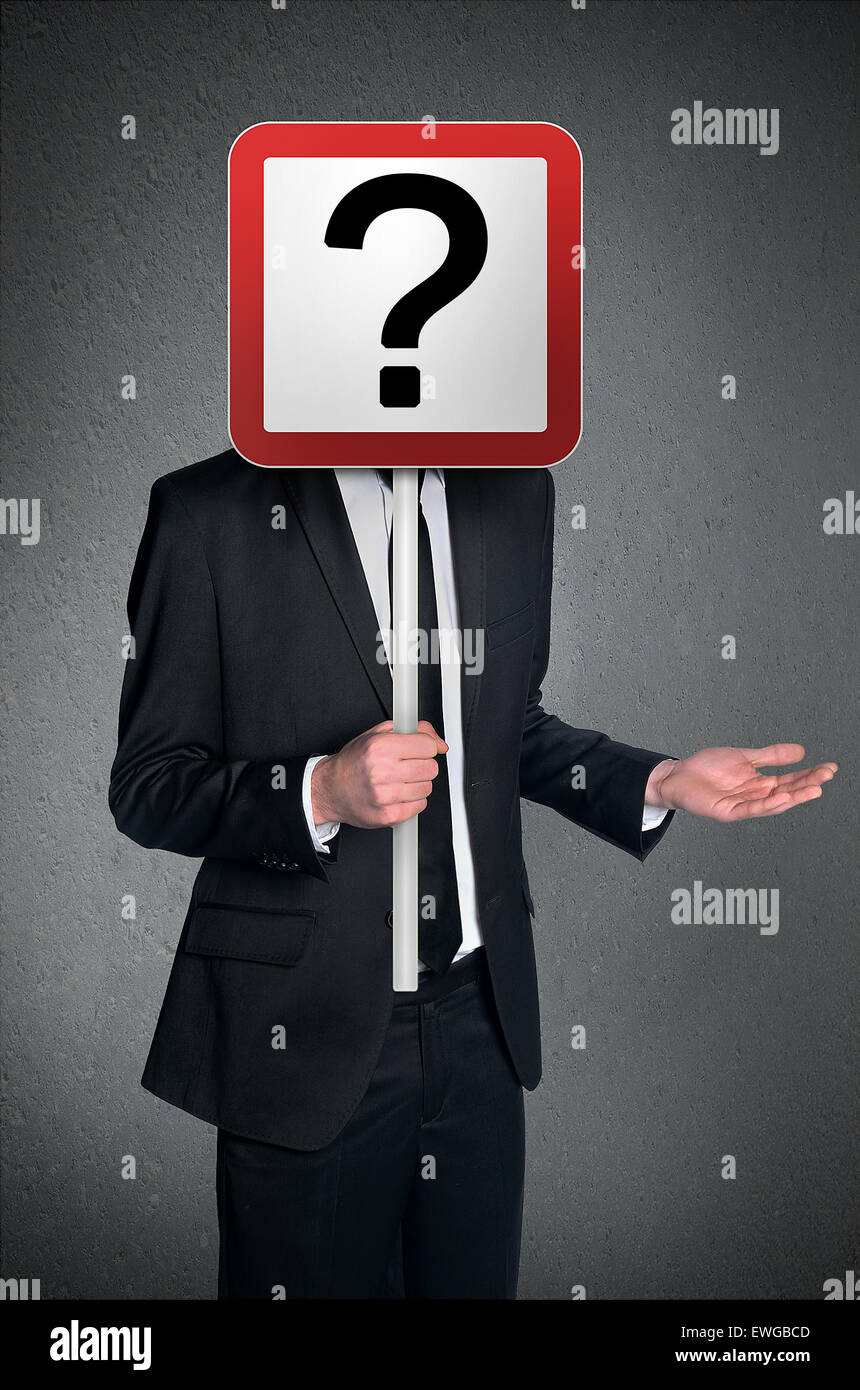 Business man holding question mark sign Stock Photo - Alamy