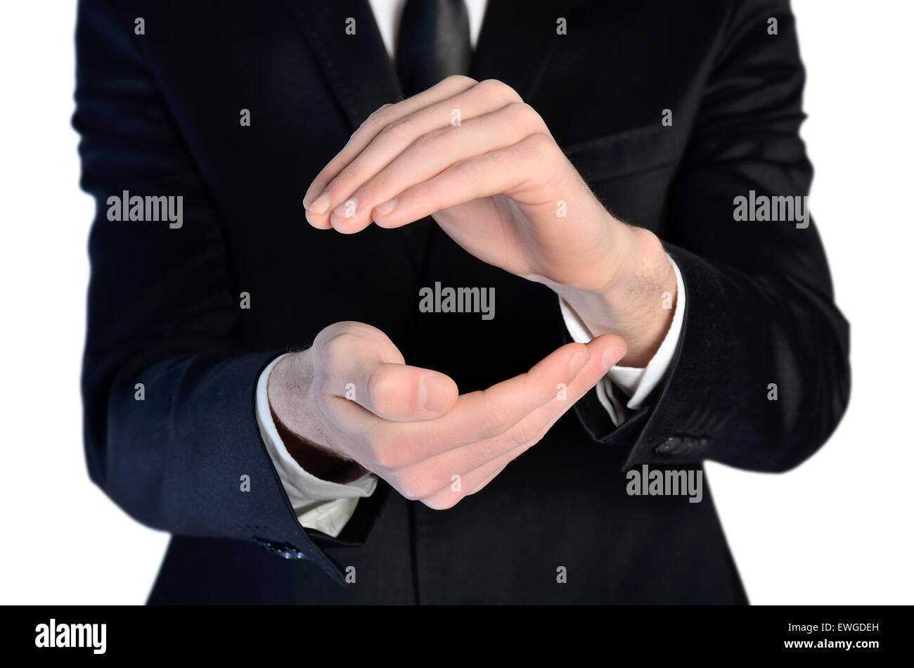 Business man hands covering something Stock Photo Alamy