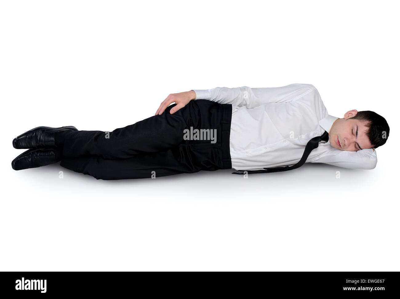 Isolated young business man sleeping Stock Photo