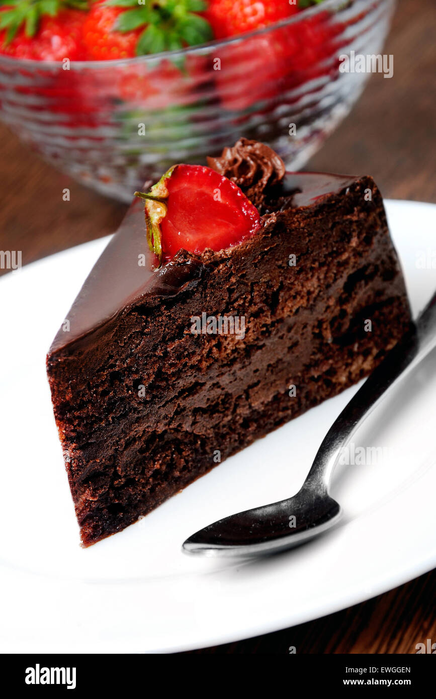 Cake with chocolate and strawberry on table Stock Photo - Alamy