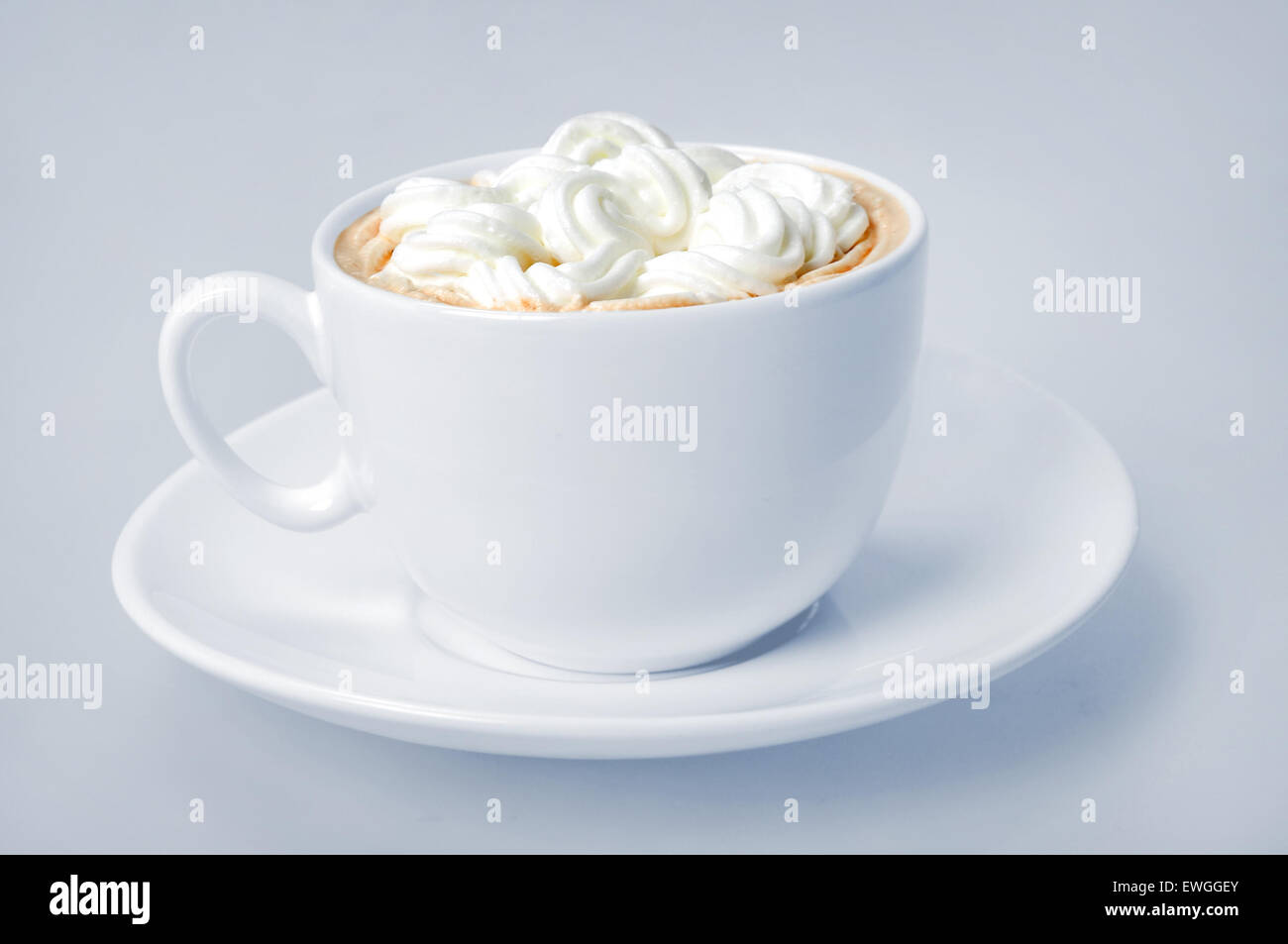 cup of coffee on blue background Stock Photo - Alamy