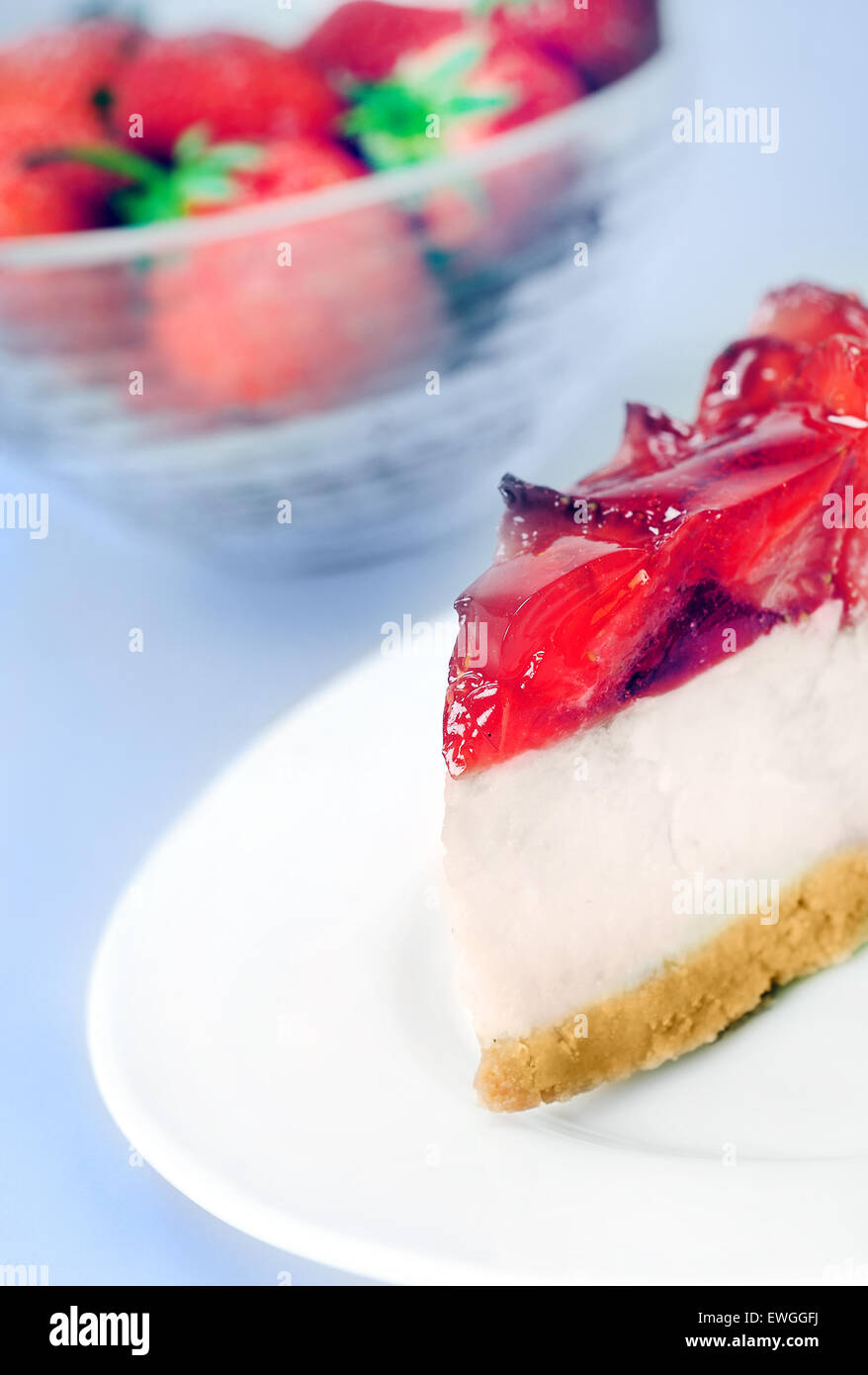 Cake with strawberry on blue background Stock Photo - Alamy